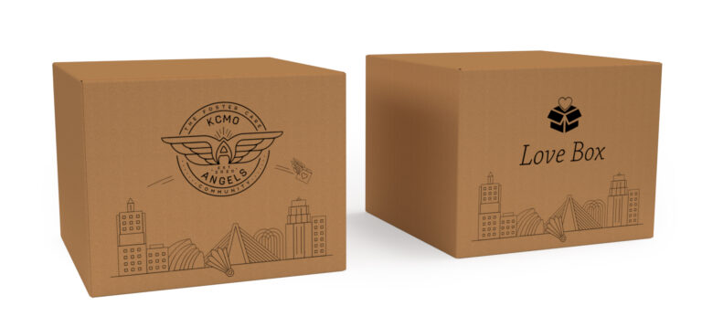 corrugated boxes with print showing KCMO Angels logo and KC skyline print